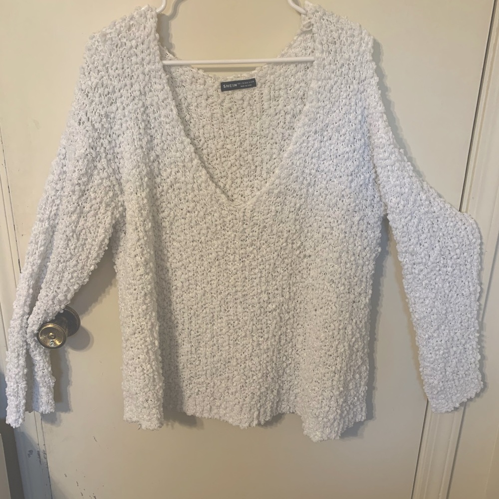 White fuzzy sweater